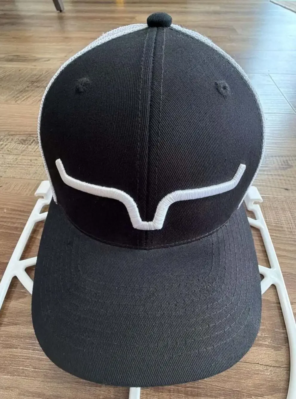 Kimes Ranch Weekly Trucker Cap in Black and White